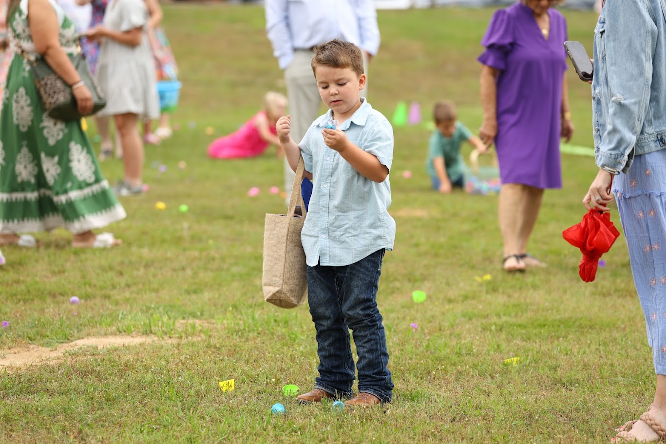 Boy in Easter egg hunt