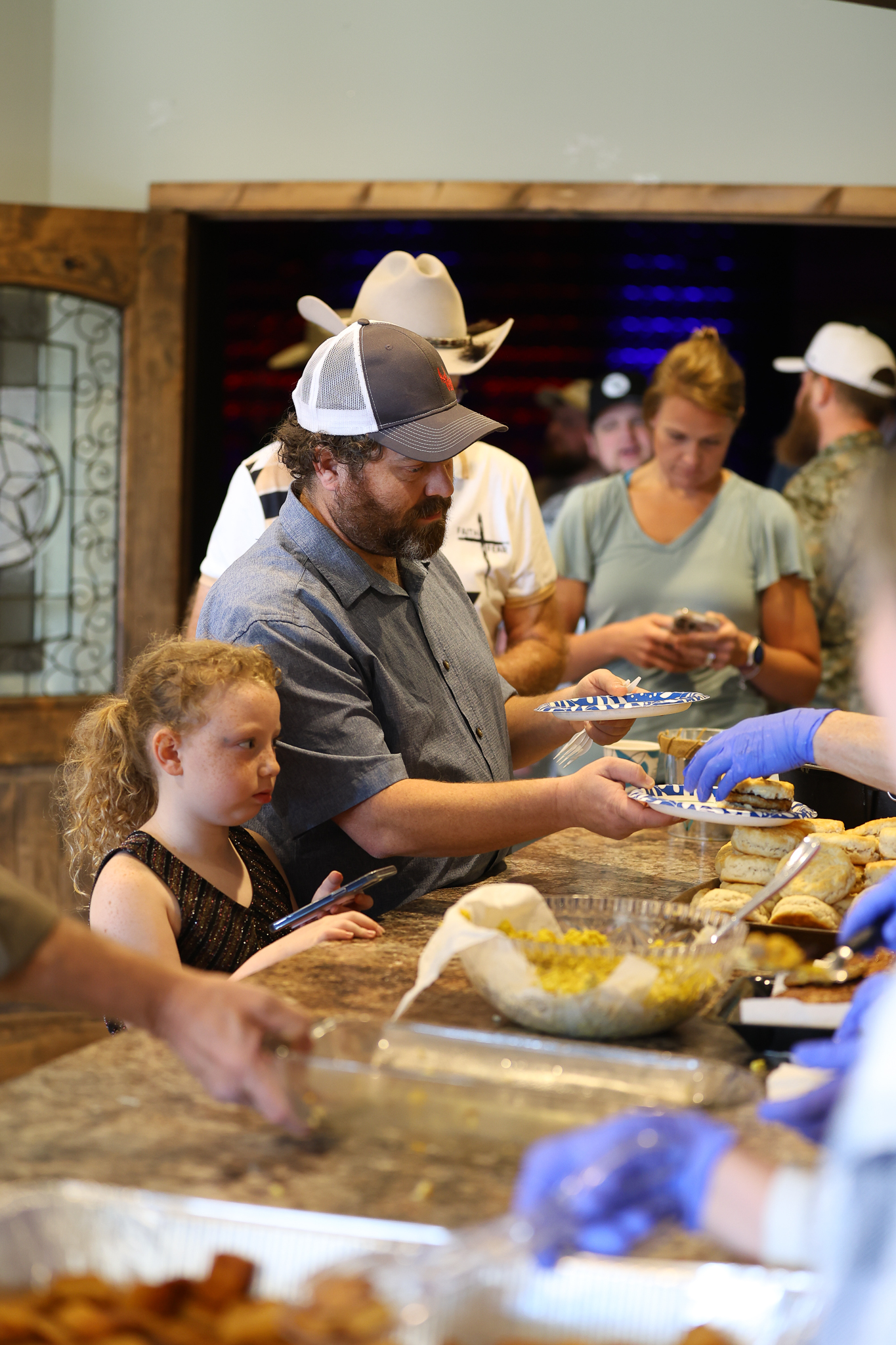 Family getting food at brunch
