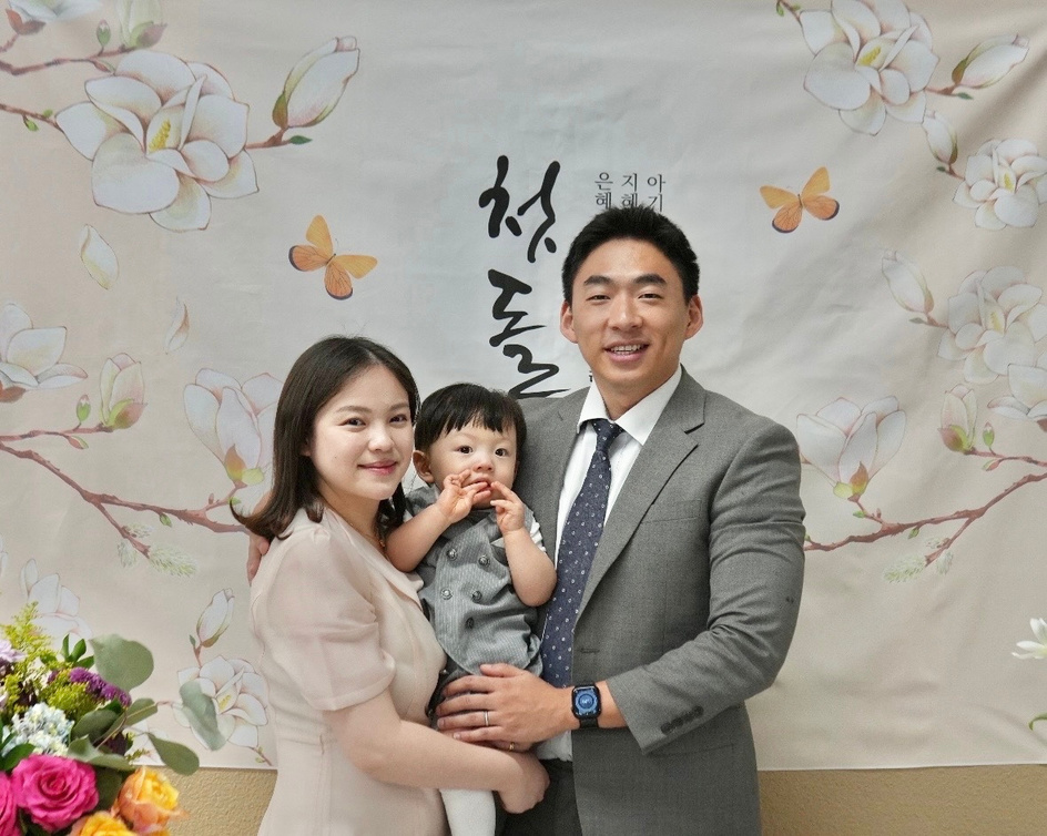 Pastor Paul Ko with his wife, Heidi, and their son