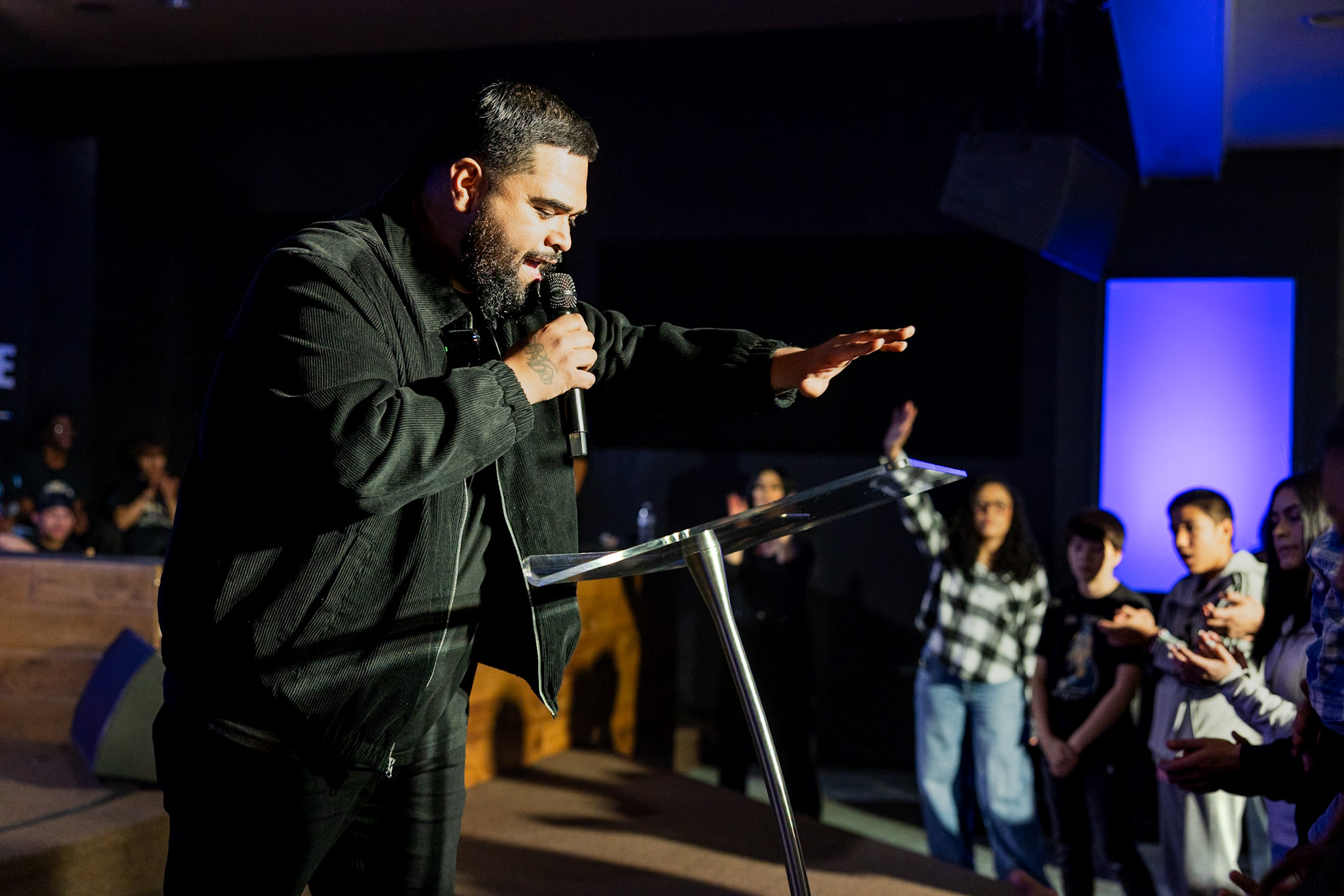 Generation Impact leader speaking with students